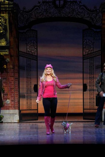 Lucy Durack as Elle with Bruiser in LEGALLY BLONDE. Image by Jeff Busby