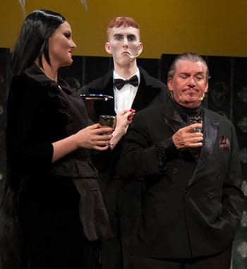 Aurelie Rouque, Connor Clarke, and Richard Murphy in The Addams Family - Brisbane Arts Theatre. [image supplied].