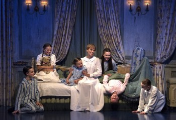 Amy Lehpamer as Maria, with the Von Trapp children in The Sound of Music. Photography by James Morgan.