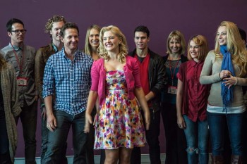 Lucy Durack lead the company in song at the first day media call