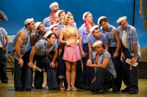 Lisa McCune and Male Ensemble in Opera Australia's South Pacific 2013. Image by Kurt Sneddon