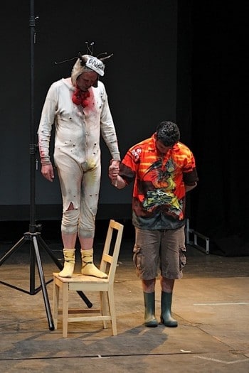 Tim Crouch and an unsuspecting audience member on stage in I, Malvolio